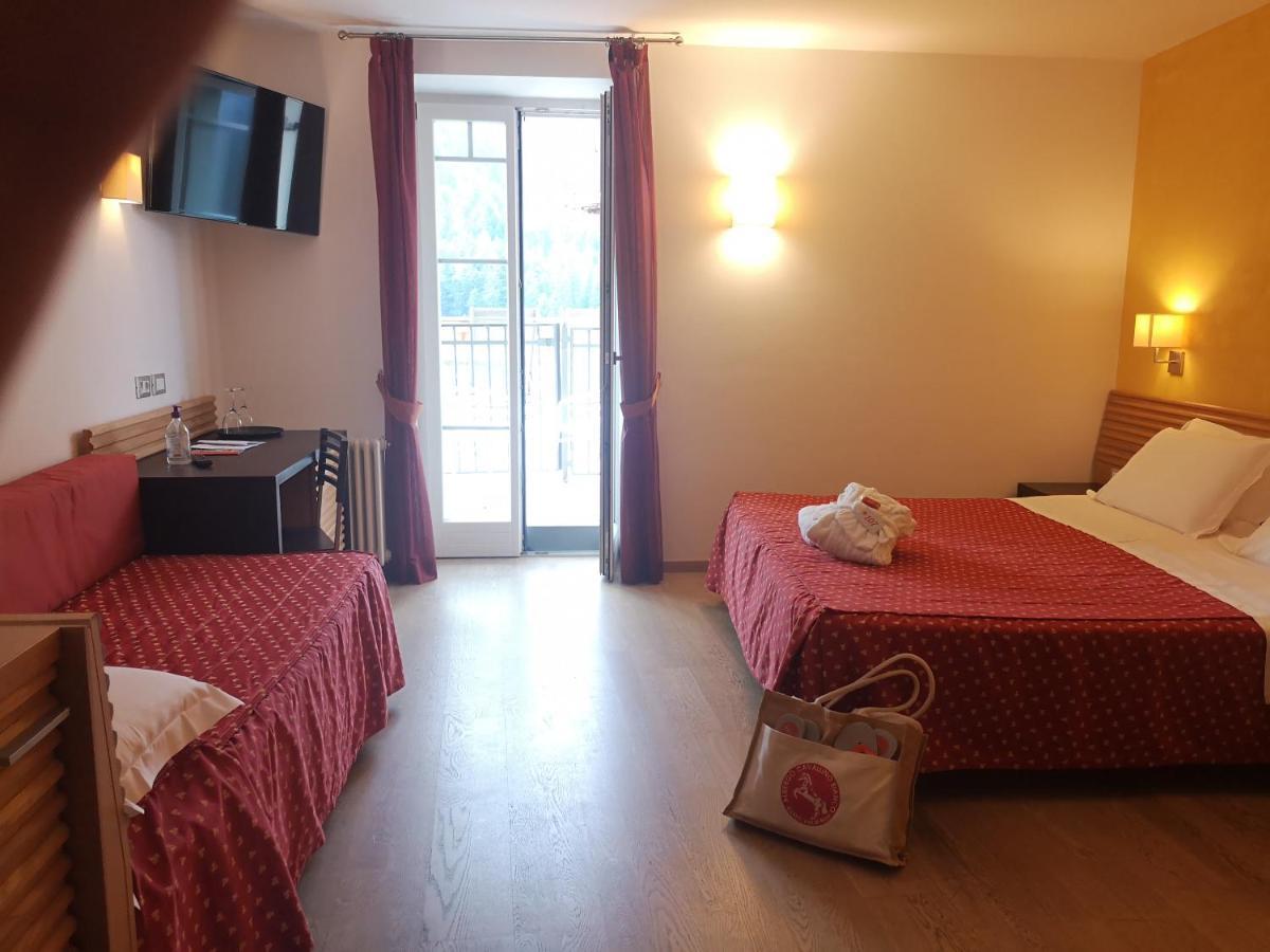 Albergo Cavallino Bianco Rumo Bagian luar foto